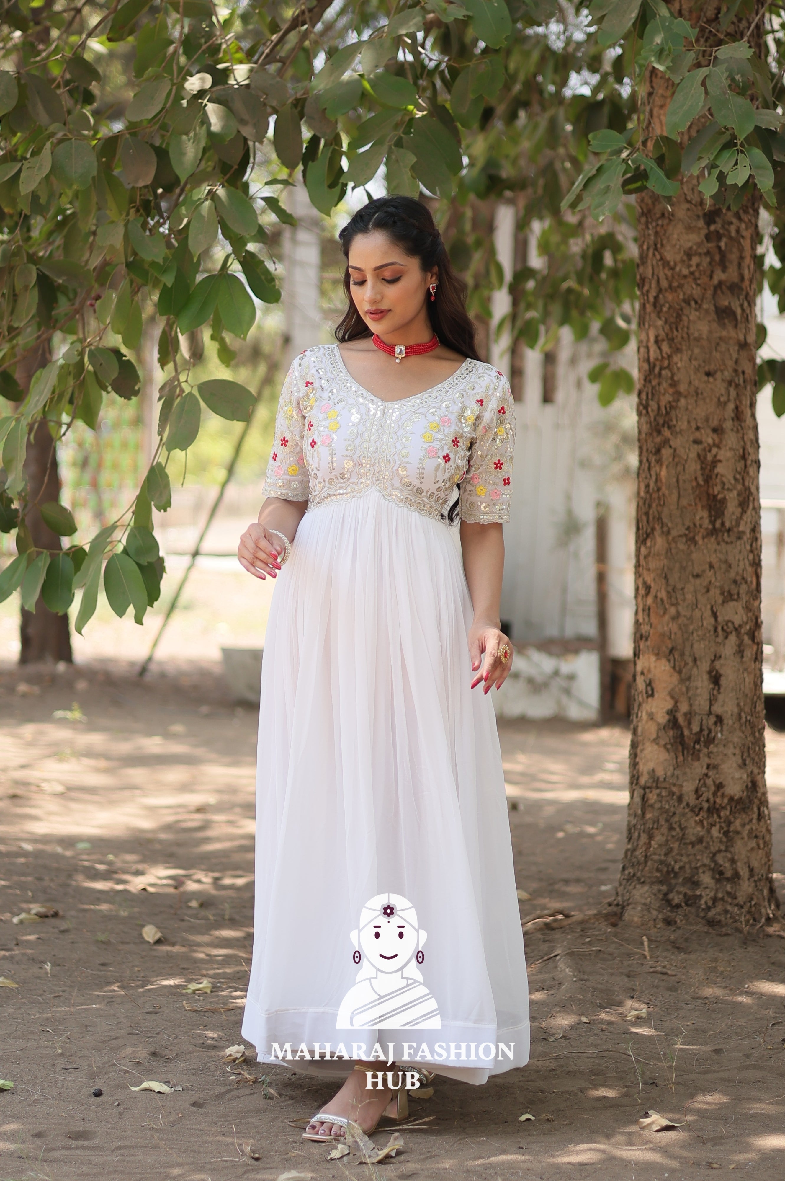 Elegant Embroidered Fabric Gown with Modern V Neckline