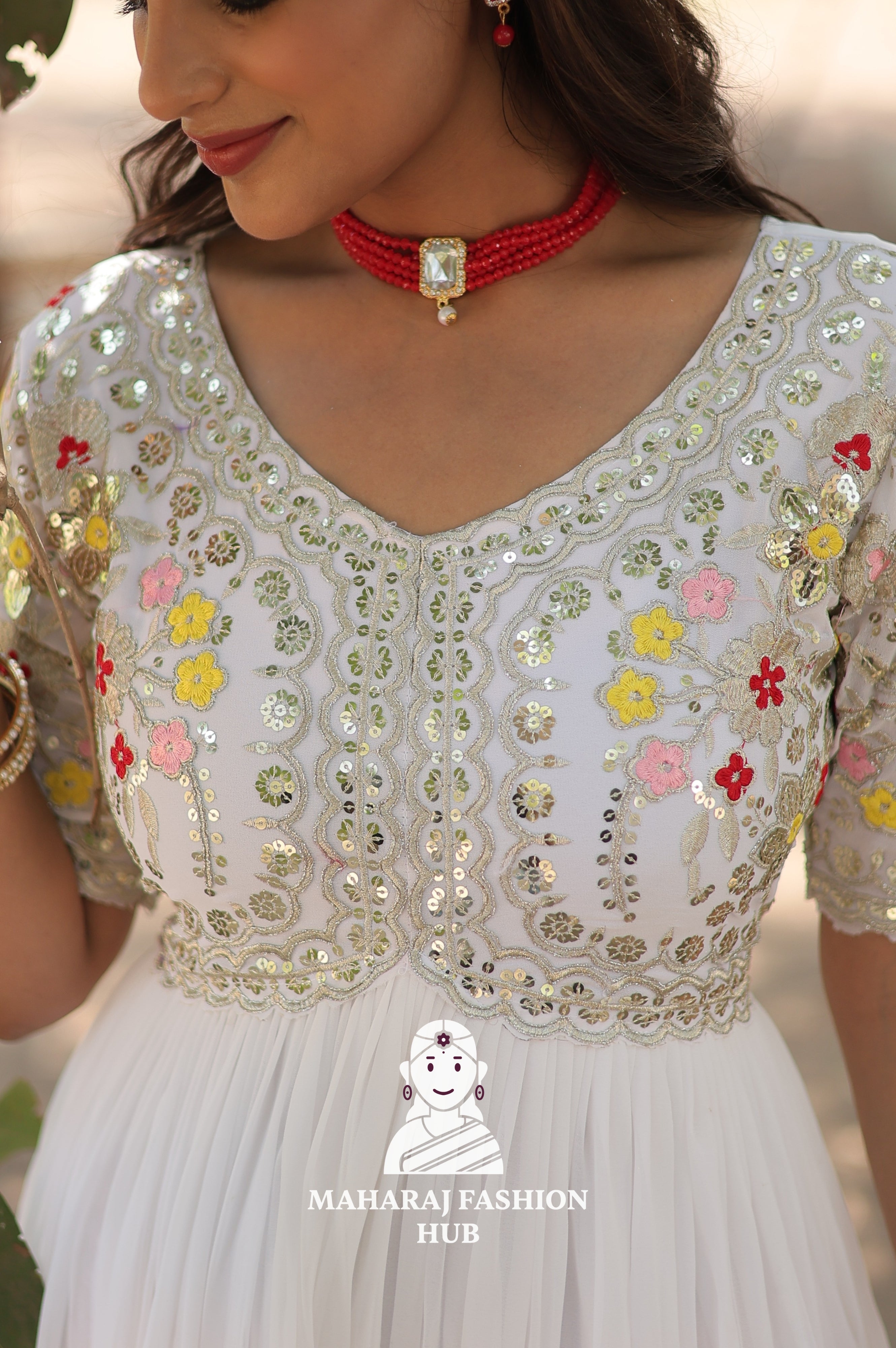 Elegant Embroidered Fabric Gown with Modern V Neckline
