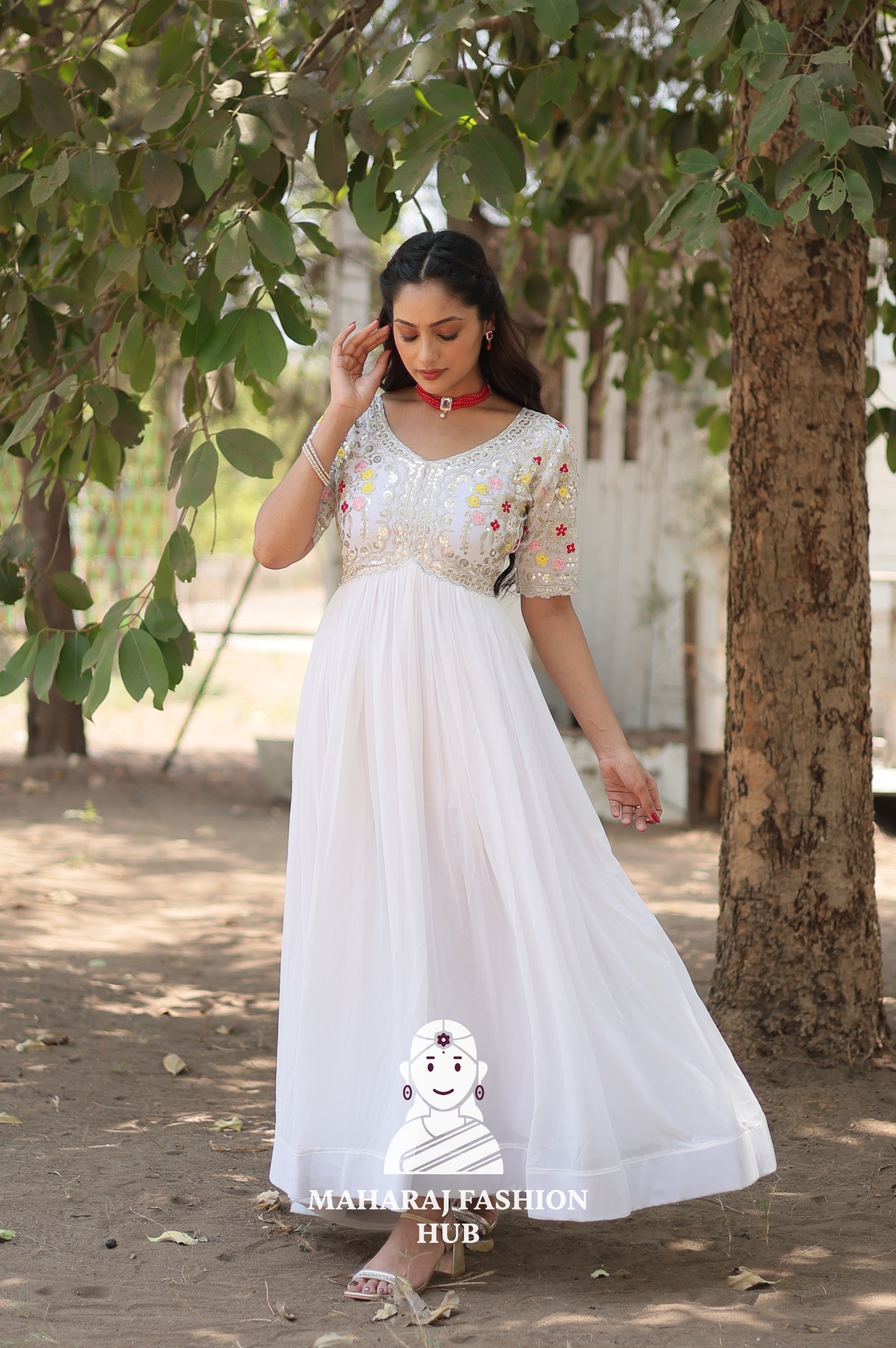 Elegant Embroidered Fabric Gown with Modern V Neckline