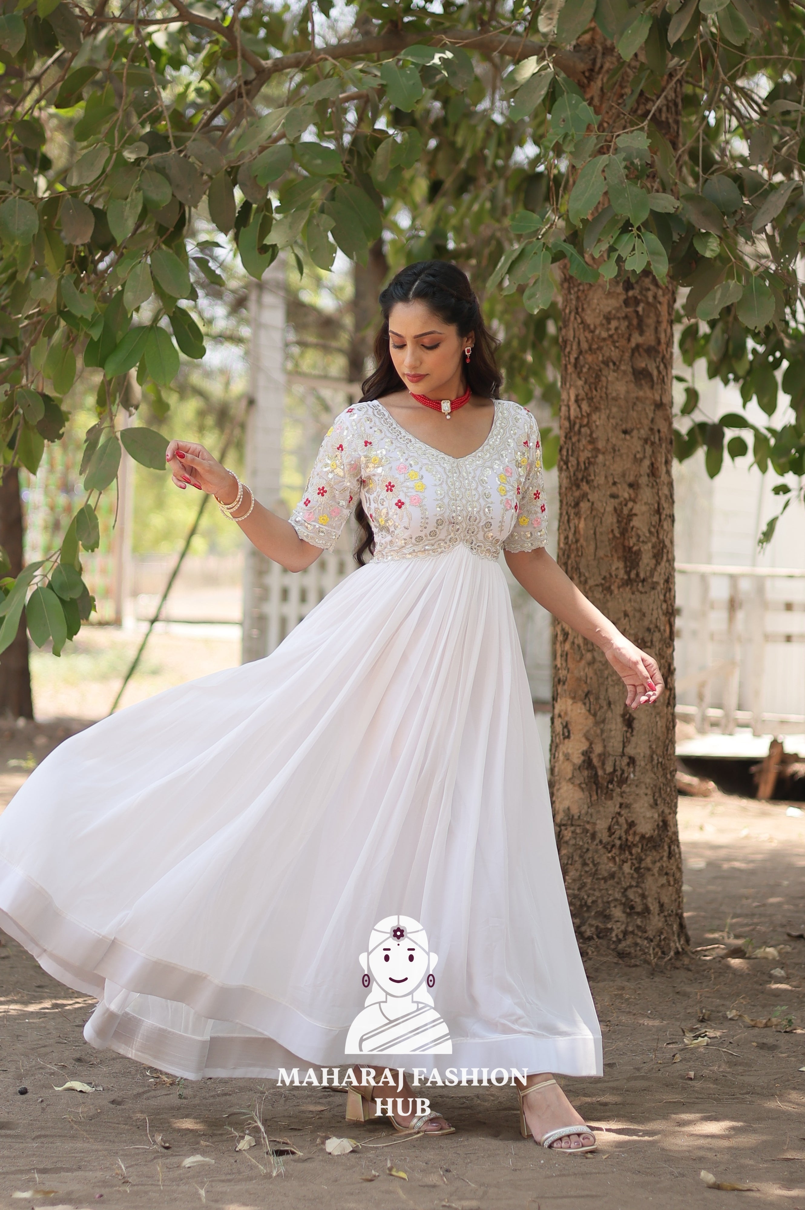 Elegant Embroidered Fabric Gown with Modern V Neckline