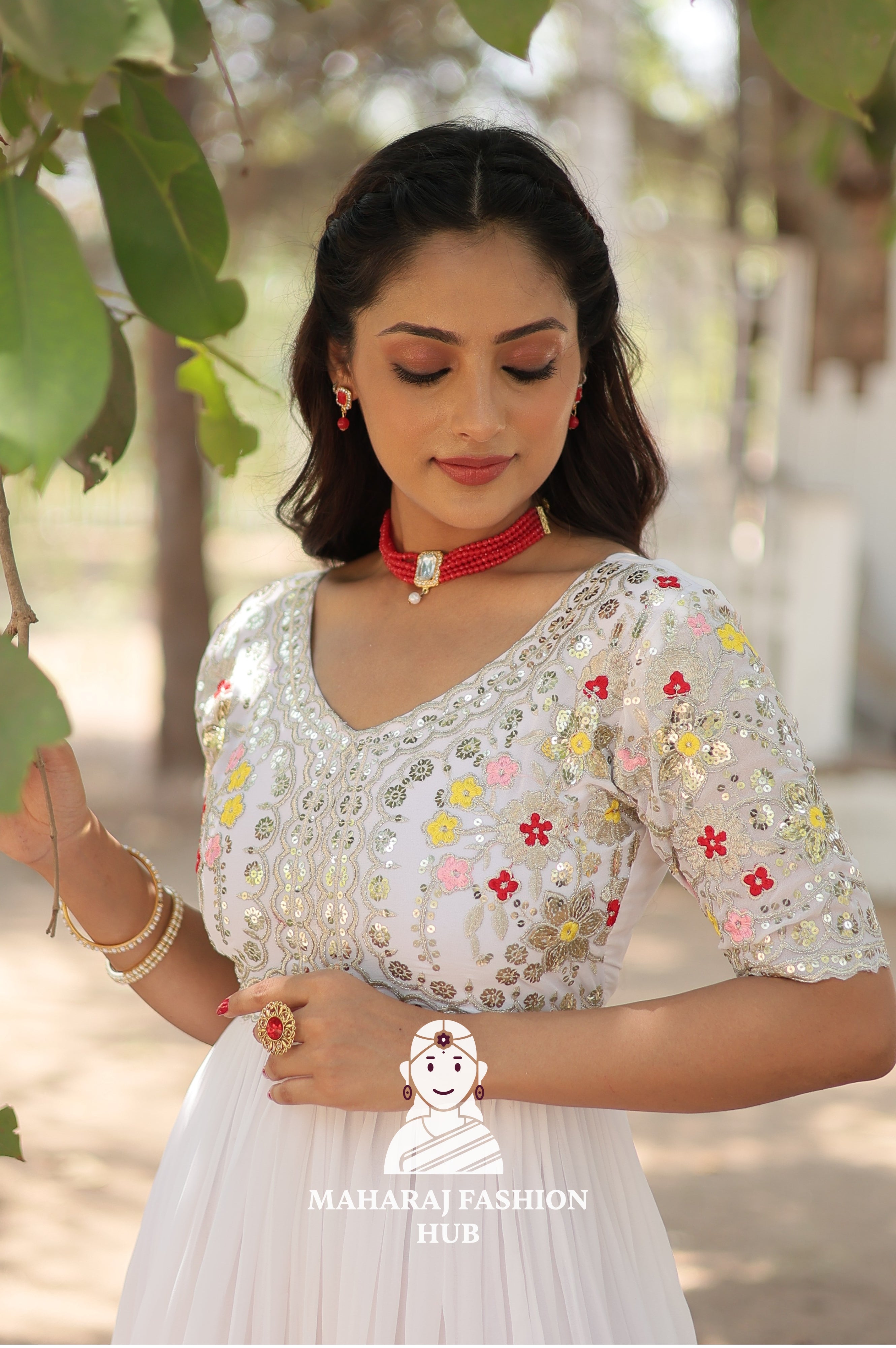 Elegant Embroidered Fabric Gown with Modern V Neckline