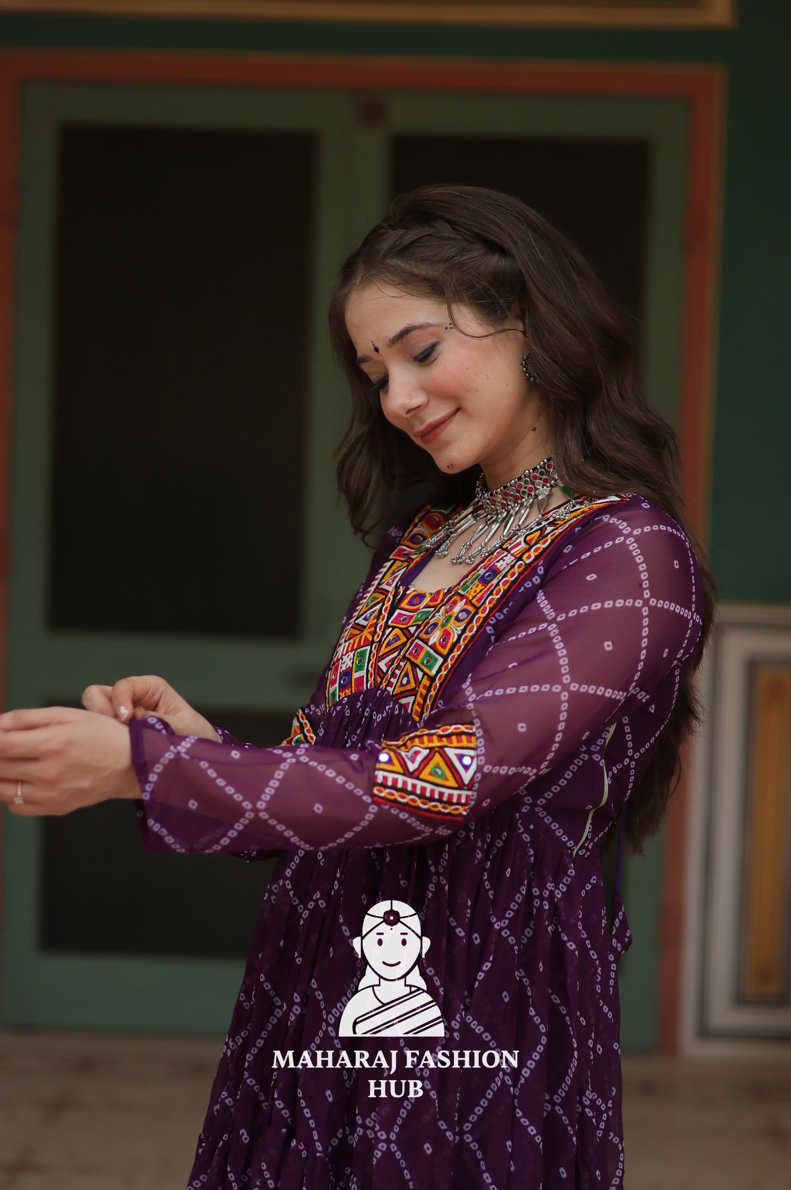 Faux Georgette Gown with Kutchi Patch and Bandhani Artistry